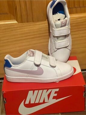 Nike Kids White Sneakers with Pink Swoosh and Blue Heel Tab